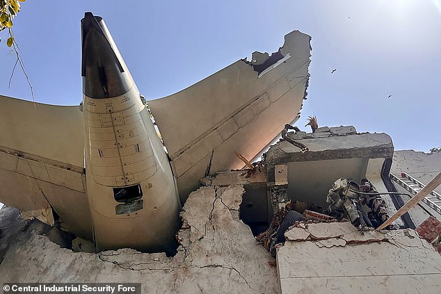 India's Directorate General of Civil Aviation has since ordered airlines to inspect the fuel switches on certain aircraft. Image shows the tailpiece of the doomed Air India flight after it crashed in a residential area near the airport in Ahmedabad on June 12