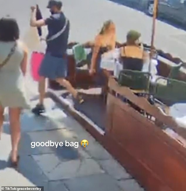 The man then put the vintage Chanel bag inside another tote bag before leaving the restaurant and crossing the road out of sight