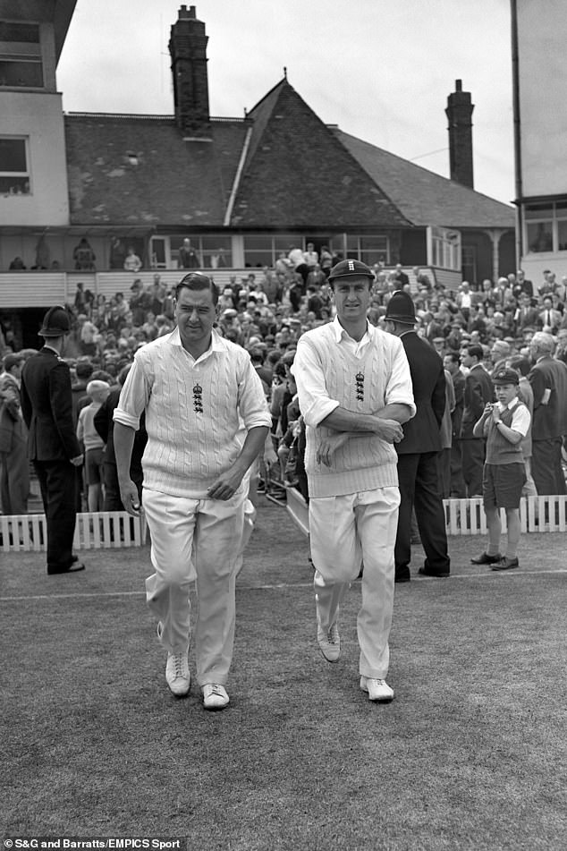 Colin Cowdrey is pictured, left, with Ted Dexter as they led the England team out during a test match against Pakistan at Headingley, in Yorkshire