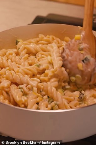 Brooklyn first put the pasta on to boil before chopping up the asparagus and other vegetables, which he then stirred into a creamy sauce