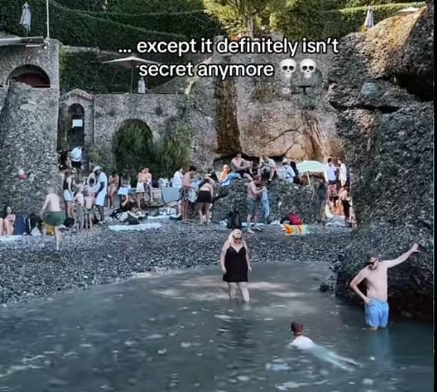 A tourist in Portofino, a small coastal town on the Italian Riviera in Liguria, revealed how even areas which are meant to be quiet have been swarmed by holidaymakers. She wrote 'you travelled to a 'secret beach' in Portofino, except it definitely isn't secret anymore', over a video of a crowded beach