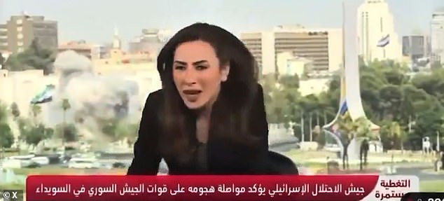 Another video showed a Syrian reporter flinching as the strikes hit the capital