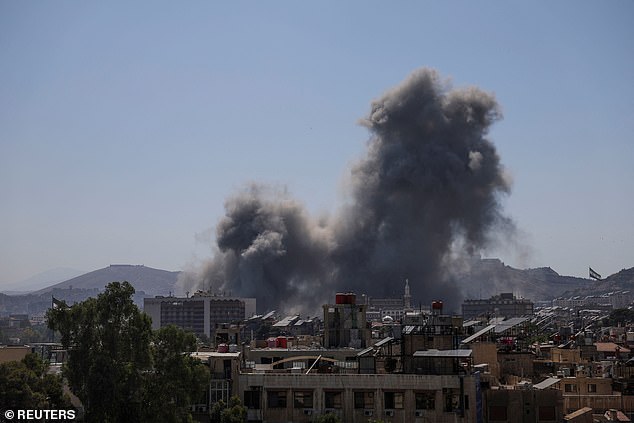 Smoke rises after Israeli strikes on Syria's defence ministry in Damascus, Syria July 16, 2025