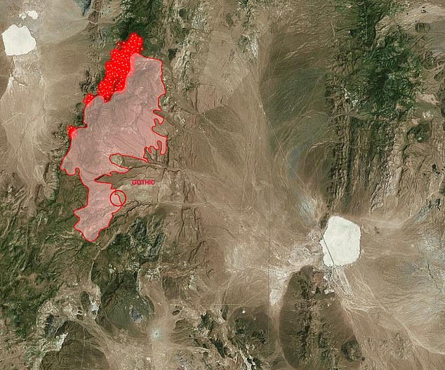While the fire (red) is outside of the military base (bottom right), it is currently sweeping over where above-ground nuclear testing occurred, the Nevada Test Site, which sits 65 miles northwest of Las Vegas