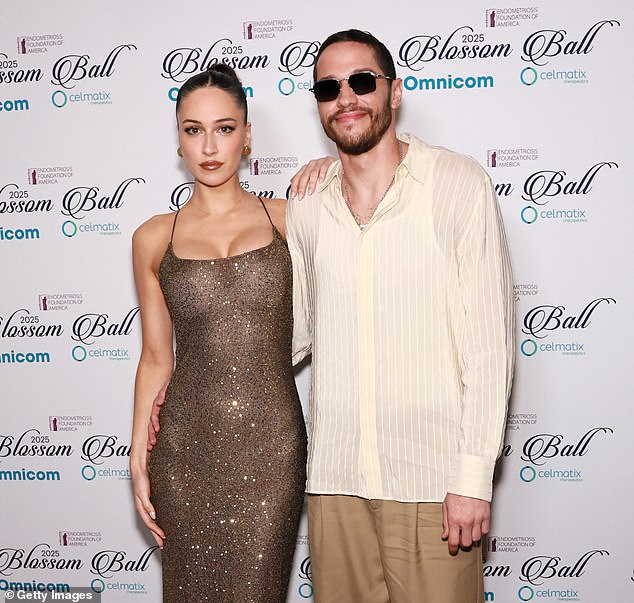 Davidson — who got sober last year — has mostly kept his relationship with Hewitt, an English model, out of the spotlight since going public in March 2025. - pictured May 2025