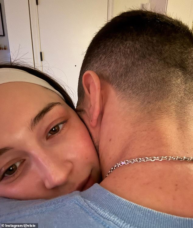 The couple looked loved-up as they hugged in another snap