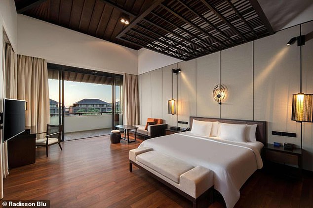 Radisson Blu Bali Uluwatu features accommodation with an outdoor swimming pool, free private parking, a fitness centre and a garden