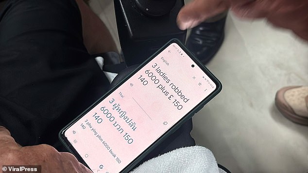 Footage shows the Brit tapping on his phone to communicate with investigators via the Google Translate app