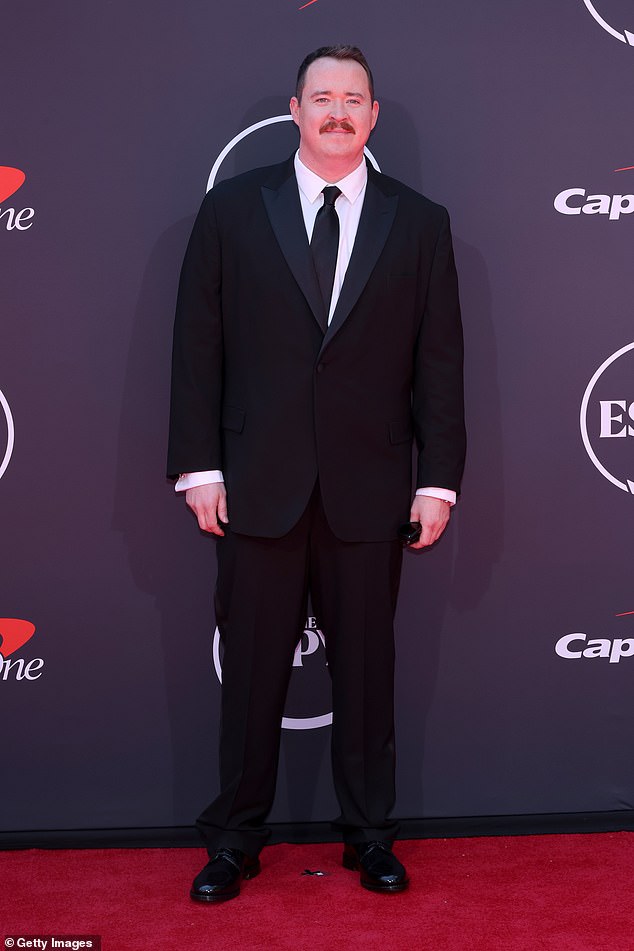 Yawn! Comedian and actor Shane Gillis, who is hosting the event, made the worst dressed list thanks to his a plain - and boring - black suit