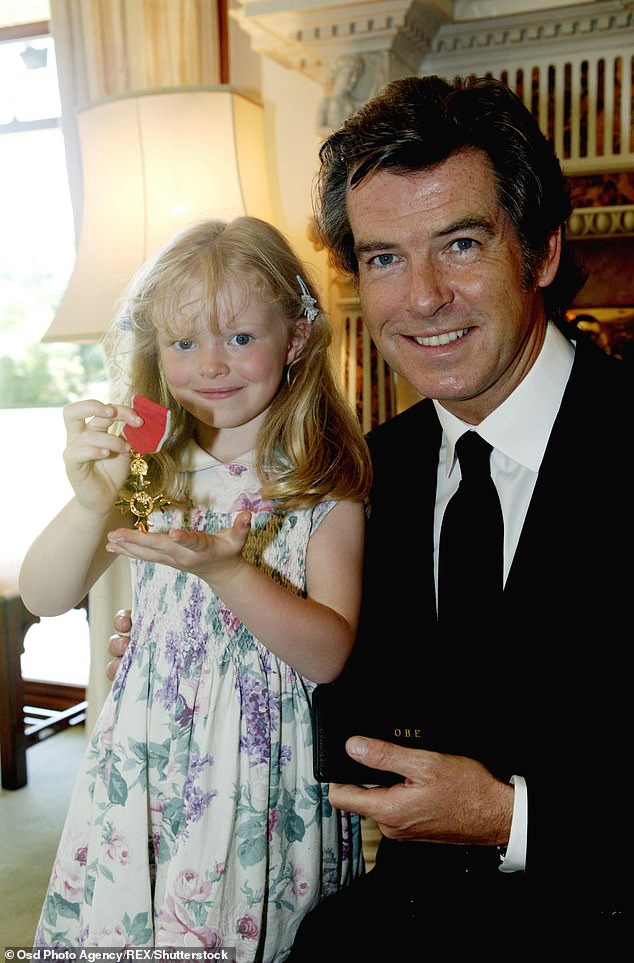 Isabella pictured with Pierce in 2003 when she was 4-years-old