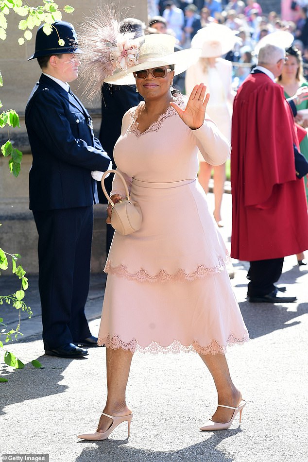 Winfrey is a longtime friend of the couple and even attended their 2018 wedding (pictured arriving at St George's Chapel at Windsor Castle)