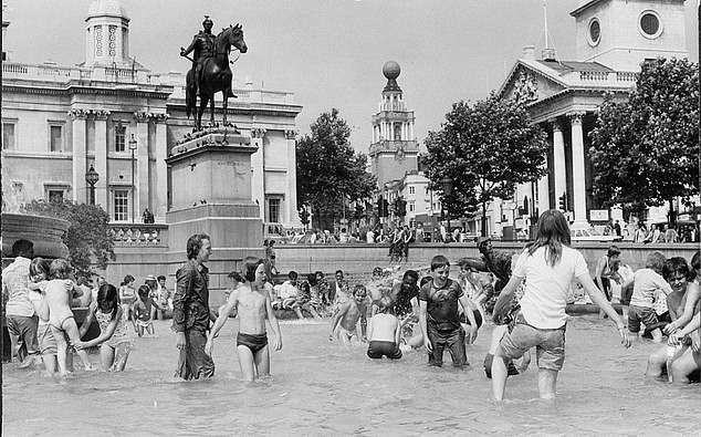 Children are seen playing in the Trafalgar Square fountain to try to cool down during the 1976 heatwave