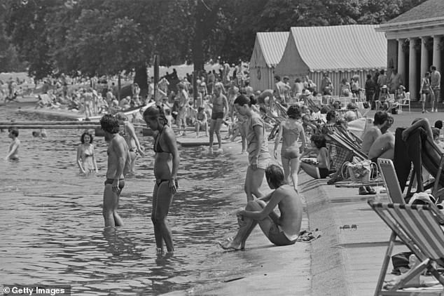Londoners relaxing on a summer day near The Serpentine in Hyde Park, London, June 1976