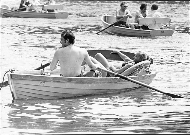Britons take to the water in boats to enjoy the hot weather during the summer of 1976