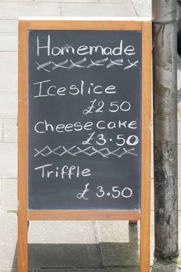 A shop sign offers sweet treats along the high street in Ebbw Vale, South Wales