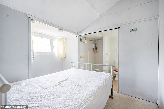The bright and airy master bedroom has an en suite shower room in addition to the chalet's family shower room