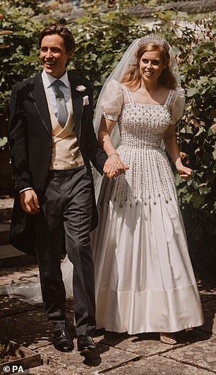 Beatrice wore a vintage dress by Norman Hartnell and the Queen Mary diamond fringe tiara, on loan from her late grandmother, Queen Elizabeth II