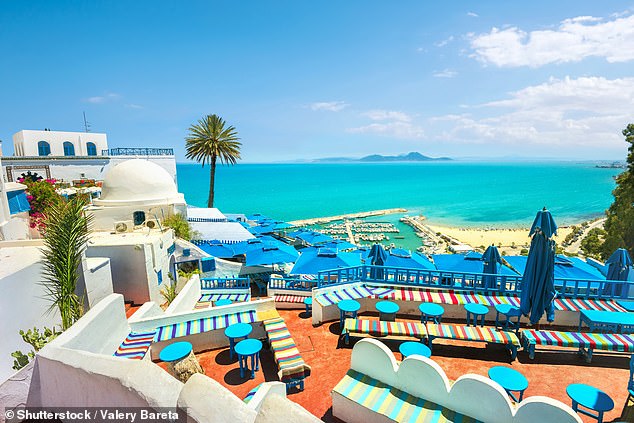 Tunisia has long been a popular destination for British tourists, known for its golden beaches, turquoise Mediterranean coastline, bustling medinas and affordable luxury (Pictured: Sidi Bou Said)