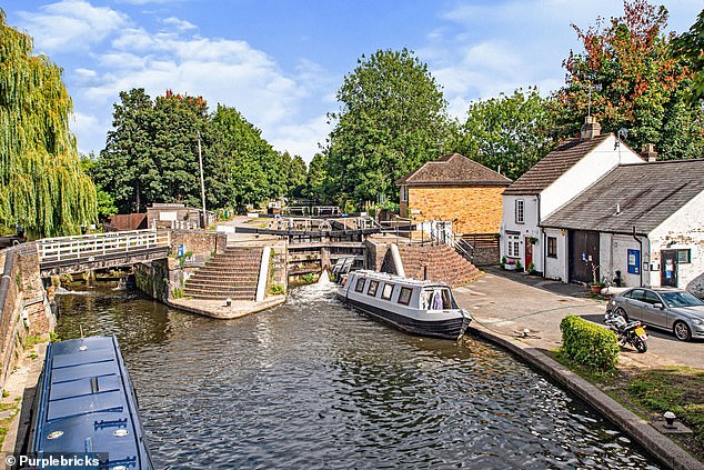 Prices in Three Rivers, Hertfordshire (Rickmansworth, pictured) have risen 13 per cent in the last year. Parts of the area can reach London by train in under an hour