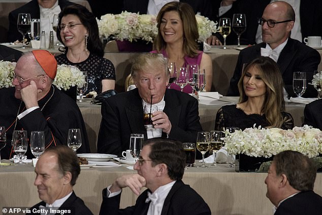 Pictured: Trump sipping a Coke during a ritzy function at the Waldorf Astoria in New York, 2016