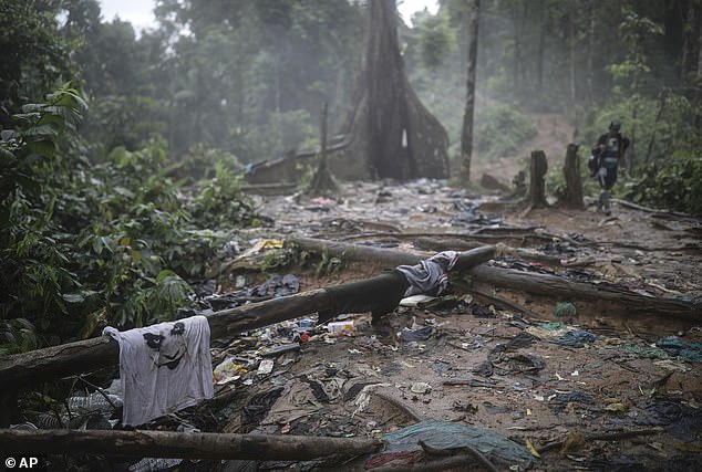 Clothing and garbage litter the trail where migrants have been trekking across the Darien Gap from Colombia to Panama in hopes of eventually reaching the United States, on May 10, 2023