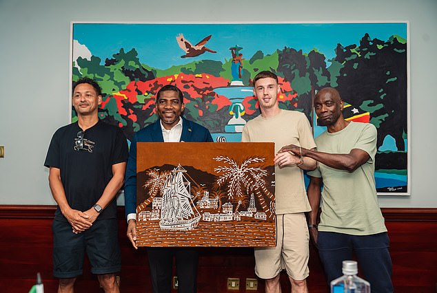 The Palmer family was presented with indigenous art by the Kittitian prime minister on arrival