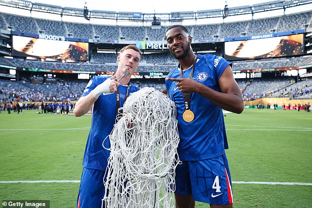 Following their victory over PSG, Palmer and Tosin Adarabioyo cut the net from one of the goals