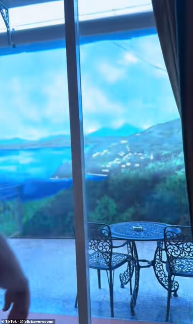 From sweeping hills, to jagged peaks, to the vivid blue waters of the lake itself, the view appeared so surreal it looked as if it had been painted... Turns out, it was