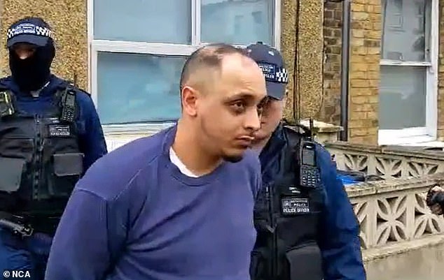 The operation was led by 41-year-old Algerian Azize Benaniba, who is seen here being taken away by police