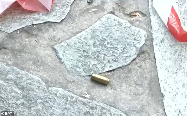 After the murder, the professor's ex-wife said she did not know of anyone who would want to harm him. (Pictured: A bullet casing from the scene)