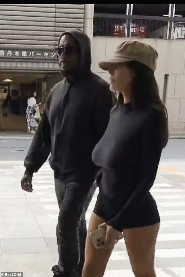 Censori kept a tan hat low over her makeup-free face as she and her spouse went from store-to-store on Thursday afternoon