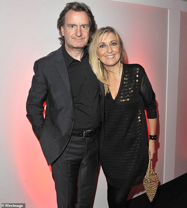 Fiona Phillips has not cooked in years and has no time for her dressing room of designer clothes as she battles Alzheimer's, her husband Martin Frizell has revealed. Pictured: The couple in 2010