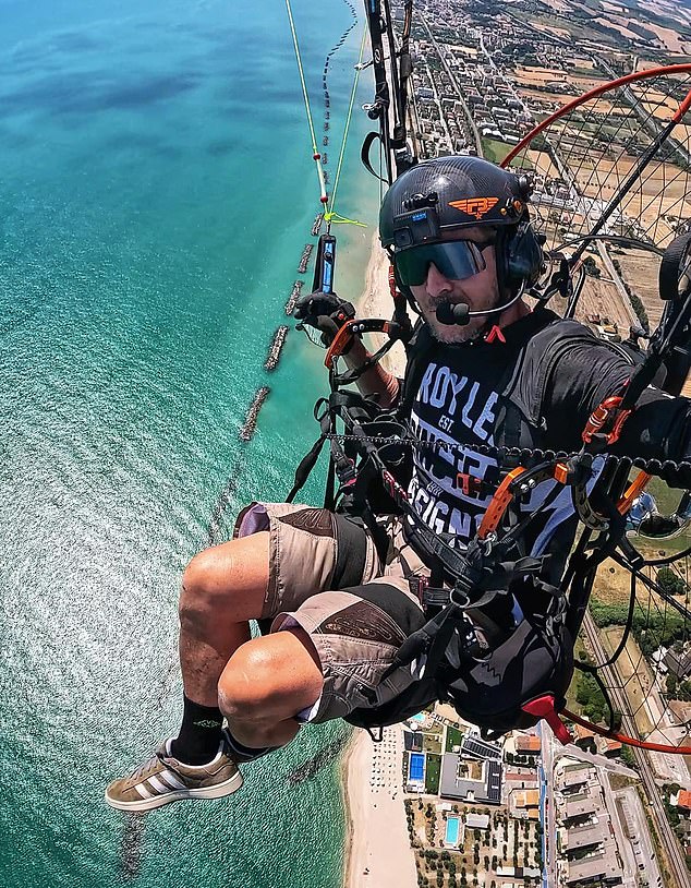 The Daredevil has been on holiday in Italy. He is pictured here just days before the crash - flying almost directly above where he was killed on Thursday