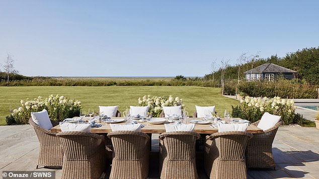 Dining al fresco - but the views could change if features including the pool, tennis court and single-storey extension on the east wing have to be removed