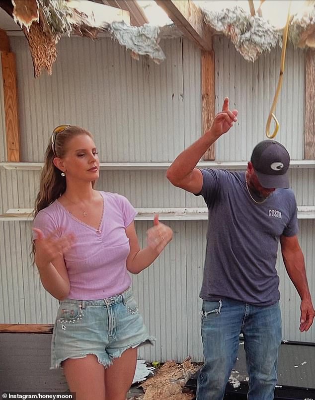 The singer also added an image of her and Jeremy inside of a house with a caved in roof
