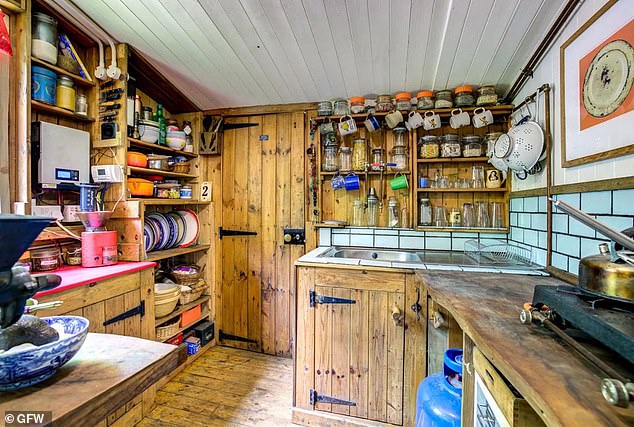 Kitted out: Stanholme has a fully functioning kitchen, decked out with wooden units