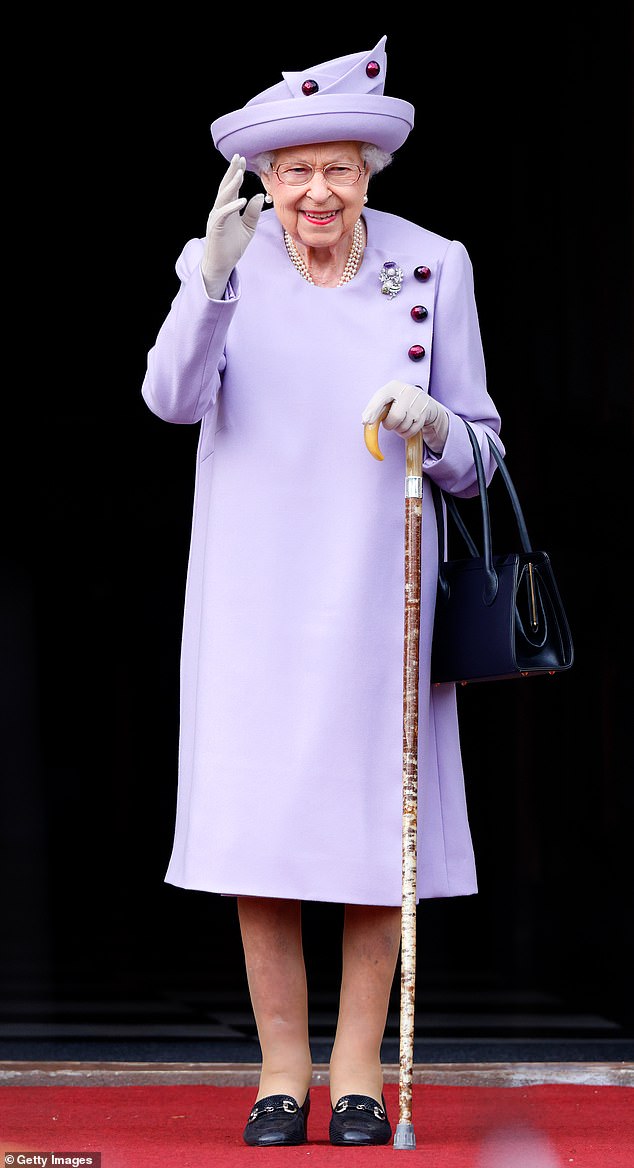 During the fittings, a toile (a mock-up of the outfit) would be tried on to check the shape, length, style and fit