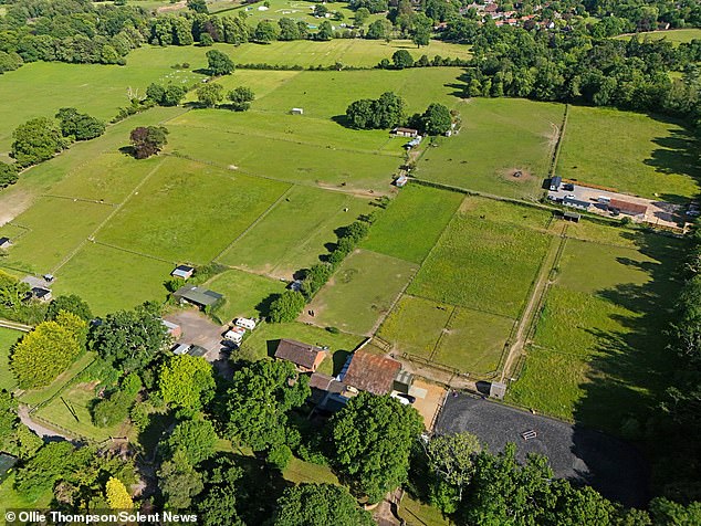 Andrew and Rachel Holloway live next to the paddocks and said that since the travellers have built on the site the land has 'completely changed' as the pony paddocks have become 'urbanised', while the 'natural beauty of the fields and surrounding area' has been 'damaged