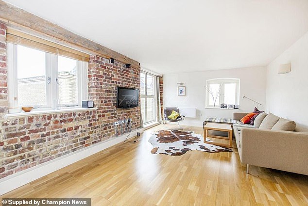 An order was made last December securing the existing costs bills on Mr Dowding's £850,000 home (pictured) in Rotherhithe Street, south London. As a result, judge Spearman described Mr Dowding as being 'in a very unhappy position'