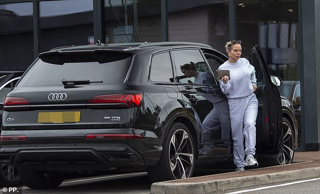 Keeping things casual for the low-key outing, the soap actress dressed down in a grey tracksuit and white trainers as she filled up her petrol