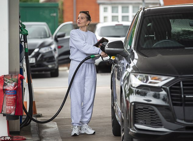 Helen appeared in good spirits as she made the most of her newfound road freedom as she ran errands in her car near her home in Bolton