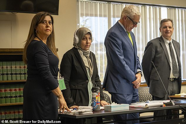Zahraa (second from left) and her lawyer Tim Leary (second from right) in court on Wednesday