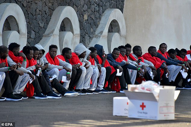 The Spanish archipelago off northwest Africa experiences large numbers of migrant arrivals. File photo: Sub-saharan migrants wait in La Restinga port in El Hierro island, the Canaries, Spain, 16 November 2023. Over 160 migrants, escorted by a Guardia Civil rescue ship, arrived on El Hierro island in a small wooden boat