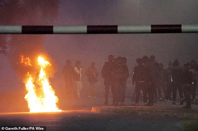 Fires blazed in the area as migrants faced off with cops and gathered in large groups
