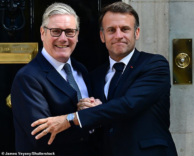 Sir Keir Starmer and Emmanuel Macron shake hands on the steps of Number 10 after they agreed a deal to tackle migrants crossing to Britain