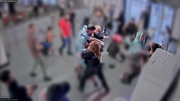 Amaaz, 20, was pictured on CCTV grappling with the two female officers while his brother Muhammad Amaad threw a series of punches at their male colleague
