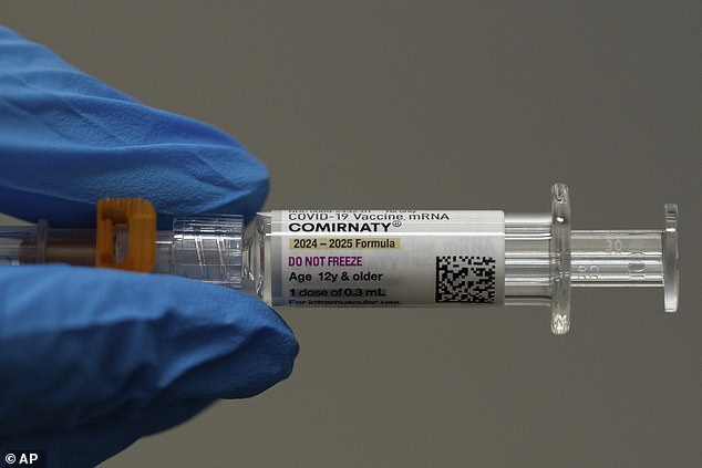 The Pfizer-BioNTech mRNA COVID-19 vaccine (pictured) has also been tied to rare inflammatory heart conditions
