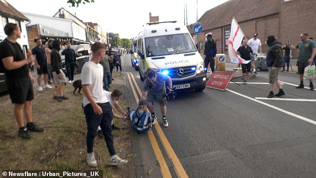 A second male is seen collapsed on the floor in the footage. It is unclear if the man needed medical attention or not