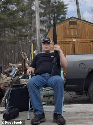 His profile picture on Facebook shows him posing with a shotgun in a chair