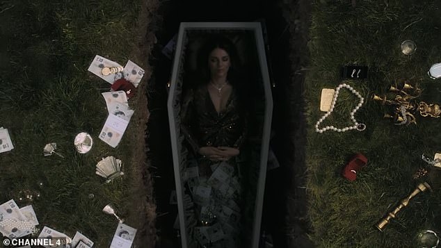 Elizabeth sported glam make-up and her brunette tresses was styled to perfection in the spooky teaser for the show which is also hosted by Rob Rinder, 47
